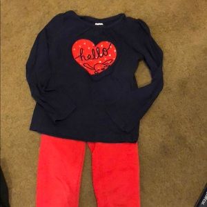 1 pair of red pants and 6 matching shirts.